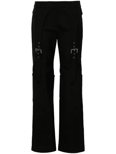 BLUMARINE PANTS WITH GUÊPIÈRE PATTERN