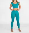 Body Wrappers Recycled Poly Criss Cross Waist Band Legging With Back Pocket In Teal In Blue