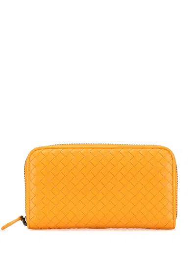 Pre-owned Bottega Veneta 2012-2024 Leather Intrecciato Zip Around Wallet Long Wallets In Orange