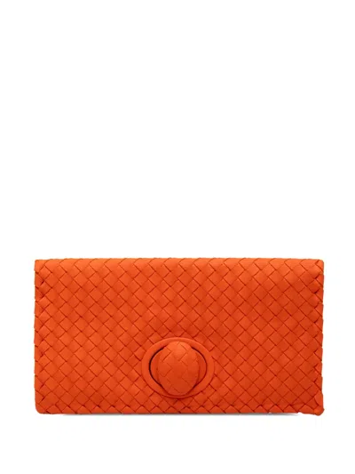 Pre-owned Bottega Veneta 2012-2025 Nappa Intrecciato Turn Lock Clutch Bag In Orange