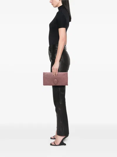 Pre-owned Bottega Veneta 2012-2025 Nappa Intrecciato Turn Lock Clutch Bag In Pink