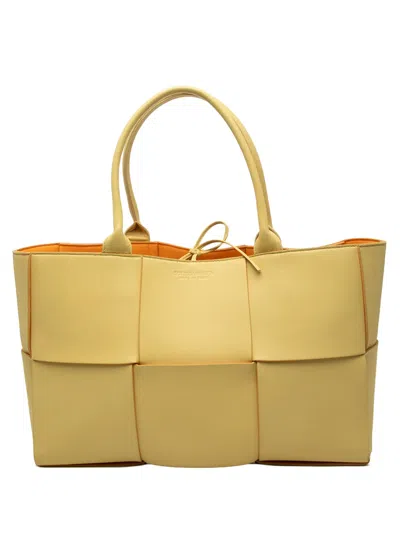 Pre-owned Bottega Veneta 2012-2025 Medium Nappa Maxi Intrecciato Arco Tote Bag In Yellow