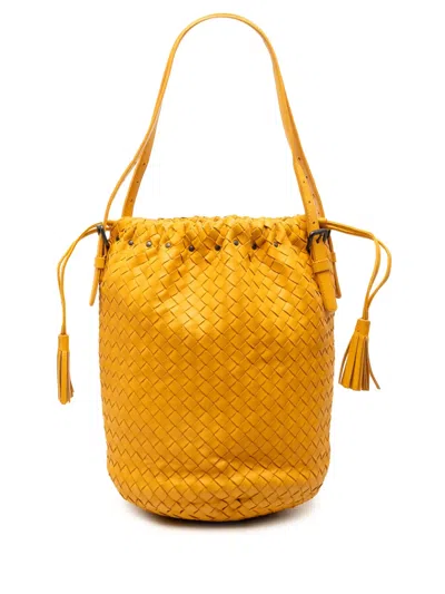 Pre-owned Bottega Veneta 2012-2025 Nappa Intrecciato Drawstring Bucket Bag In Orange