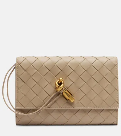 Bottega Veneta Andiamo Leather Pouch With Strap In Sand