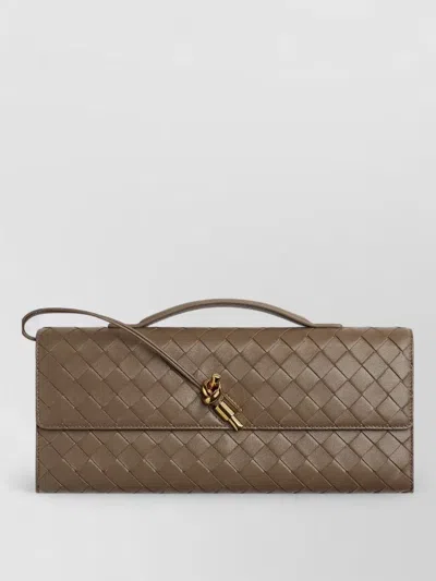 Bottega Veneta Andiamo Leather Clutch Bag In Brown