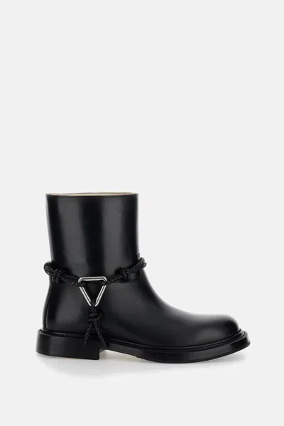 Bottega Veneta Women Black Ankle Boots With Metallic Detail On The Side And Applied Laces In Leather In Animal Print