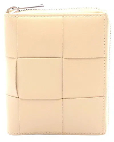 Bottega Veneta Beige Calfskin Cassette Zip Around Wallet (authentic Pre-loved) In Yellow