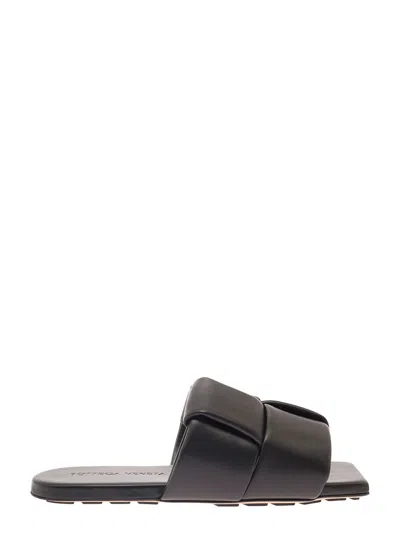 BOTTEGA VENETA BOTTEGA VENETA WOMEN BLACK FLAT MULES WITH PADDED INTRECCIO BAND IN LEATHER WOMAN