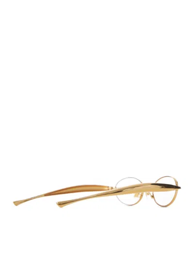Bottega Veneta Gold Metal Oval Glasses Featuring Distinctive Sculptural Sardine-shape