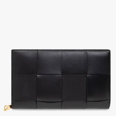 Bottega Veneta Cassette Intrecciato Leather Zip-around Wallet In ["black","gold Tone"]