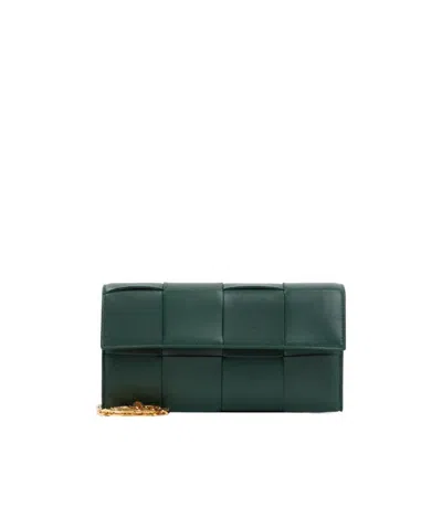 Bottega Veneta Cassette Leather Clutch Bag In Green