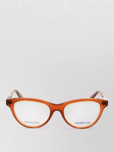 Bottega Veneta Cateye Acetate Frames Transparent Temples In Orange