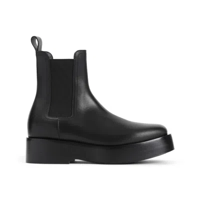 BOTTEGA VENETA BOTTEGA VENETA CHUNKY PLATFORM BOOTS WITH ROUNDED TOE DESIGN