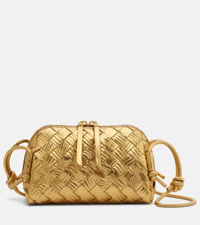 Bottega Veneta Concert Intrecciato Metallic Leather Pouch In Gold