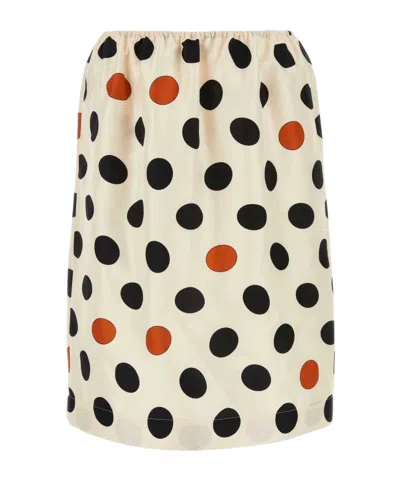 BOTTEGA VENETA BOTTEGA VENETA REAR SLIT POLKA DOT PRINTED SKIRT