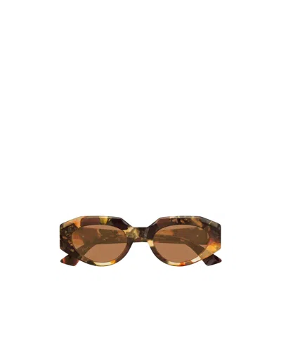 Bottega Veneta Eyewear Oval Frame Sunglasses In Brown