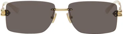 Bottega Veneta Gold Rectangular Metal Sunglasses In 002 Gold