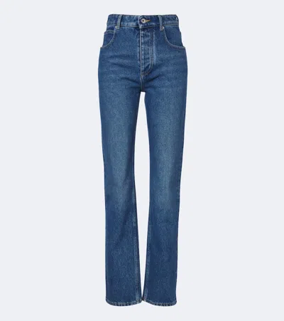 Bottega Veneta Intrecciato Leather-trimmed Slim Jeans In Blue