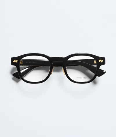 Bottega Veneta Intrecciato Panthos Eyeglasses In Black/transparent