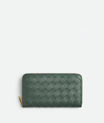 Bottega Veneta Intrecciato Zip-around Leather Wallet In Green