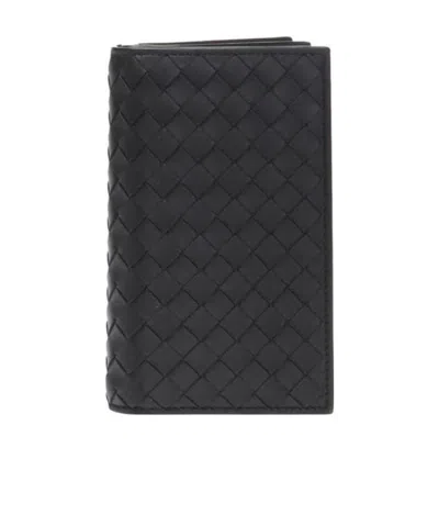 Bottega Veneta Knitted Flip Purse In Black