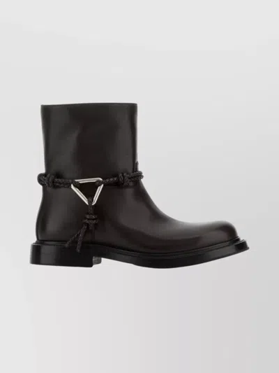 BOTTEGA VENETA LEATHER ANKLE BOOTS FEATURING DECORATIVE HARDWARE
