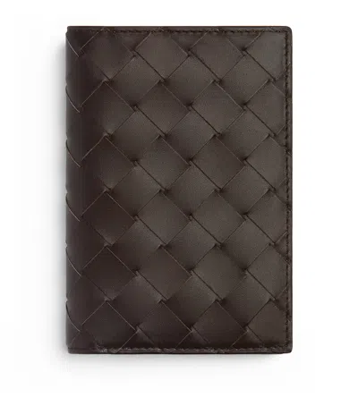 Bottega Veneta Leather Intrecciato Bifold Passport Cover In Brown