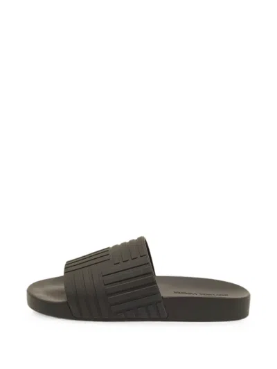 Pre-owned Bottega Veneta Logo-embossed Slides In Black