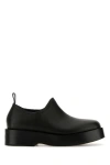 Bottega Veneta Black Leather Torino Slip Ons In Black