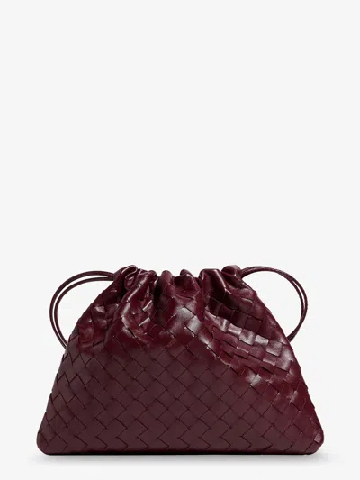 Bottega Veneta Medium Dustbag Leather Clutch Bag With Woven Effect In Red