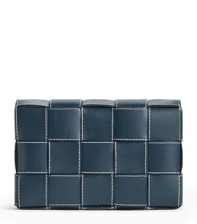 Bottega Veneta Cassette Medium Intrecciato Leather Messenger Bag In Blue