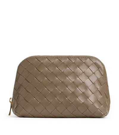 Bottega Veneta Medium Leather Intrecciato Half-moon Pouch In Brown