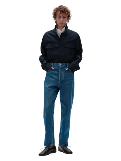 Bottega Veneta Medium Wash Wide-leg Jeans With Embossed Leather Intrecciato Back Patch In Yellow