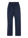 Bottega Veneta Men Blue Pants With Elastic Waist And Logo Patch On The Side In Cotton And Silk Man In Blue