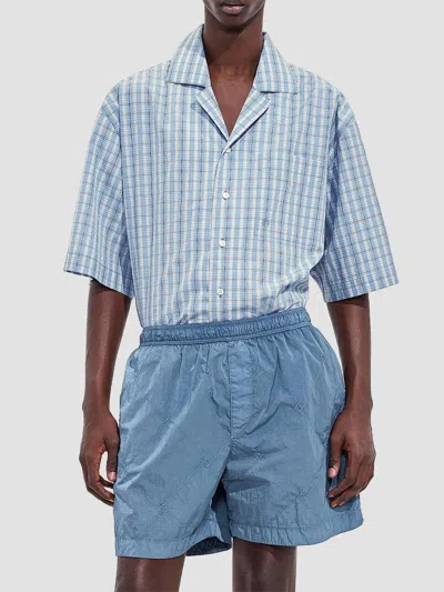 Bottega Veneta Men's Intrecciato Crinkled Swim Shorts In Utility Blue