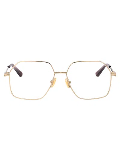 Bottega Veneta Gold-gold-transparent Metal Glasses In Yellow
