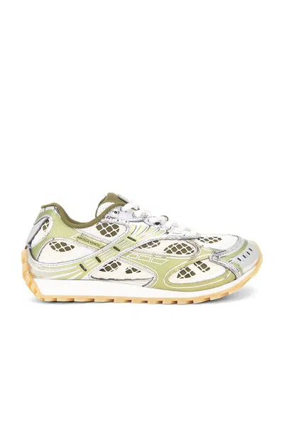 Bottega Veneta Orbit Metallic Net Runner Trainers In Limone