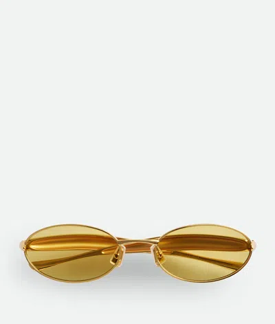 Bottega Veneta Sardine Oval Sunglasses In Gold
