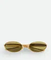 Bottega Veneta Sardine Oval Sunglasses In Yellow