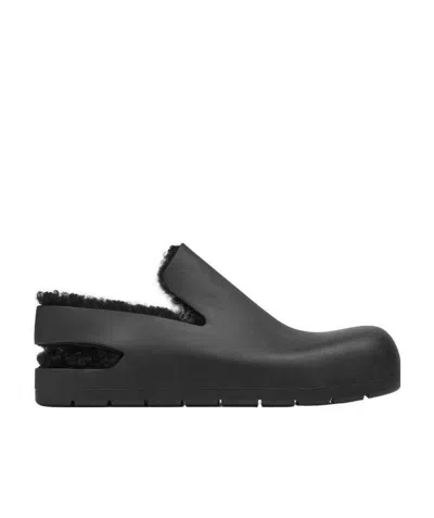 Bottega Veneta Puddle Shearling-lined Slingback Mules In Black