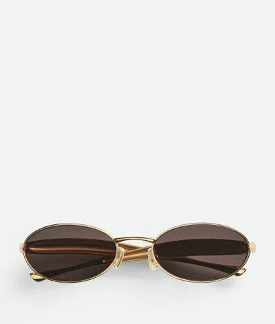 Bottega Veneta Ovale Sardine Sonnenbrille In Gold/gold/grey