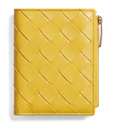 Bottega Veneta Small Leather Intrecciato Bifold Wallet In Yellow