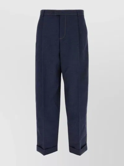 BOTTEGA VENETA TAILORED DENIM TROUSERS FEATURING CUFFED HEM