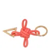 BOTTEGA VENETA TRIANGLE SQUARE DOUBLE KNOT KEY RING