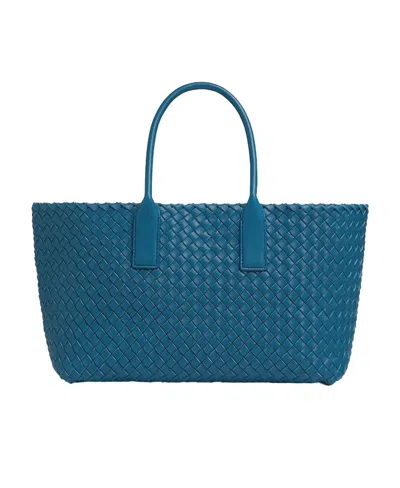 Bottega Veneta Trumpet Woven Handbag In Blue