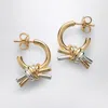 Bottega Veneta Two-tone Knot Hoop Earrings In Gold