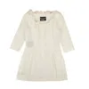 BOUTIQUE MOSCHINO NWT BOUTIQUE MOSCHINO WHITE BOW ACCENTED FIT & FLARE MINI DRESS