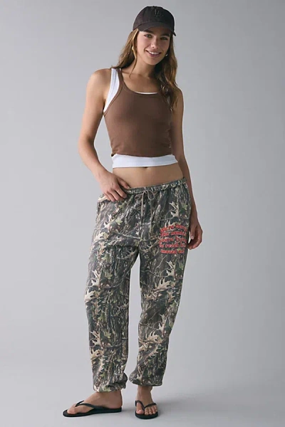 Boys Lie Kimmy Manhunt Camo Graphic Sweatpant In Camo, Women's At Urban Outfitters In Gold