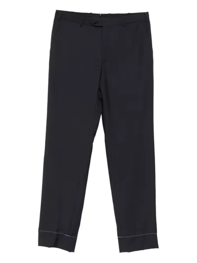 Brioni Button-fastening Cuffed Trousers In Black