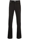 Brioni Low-rise Slim-fit Tapered Trousers In 褐色